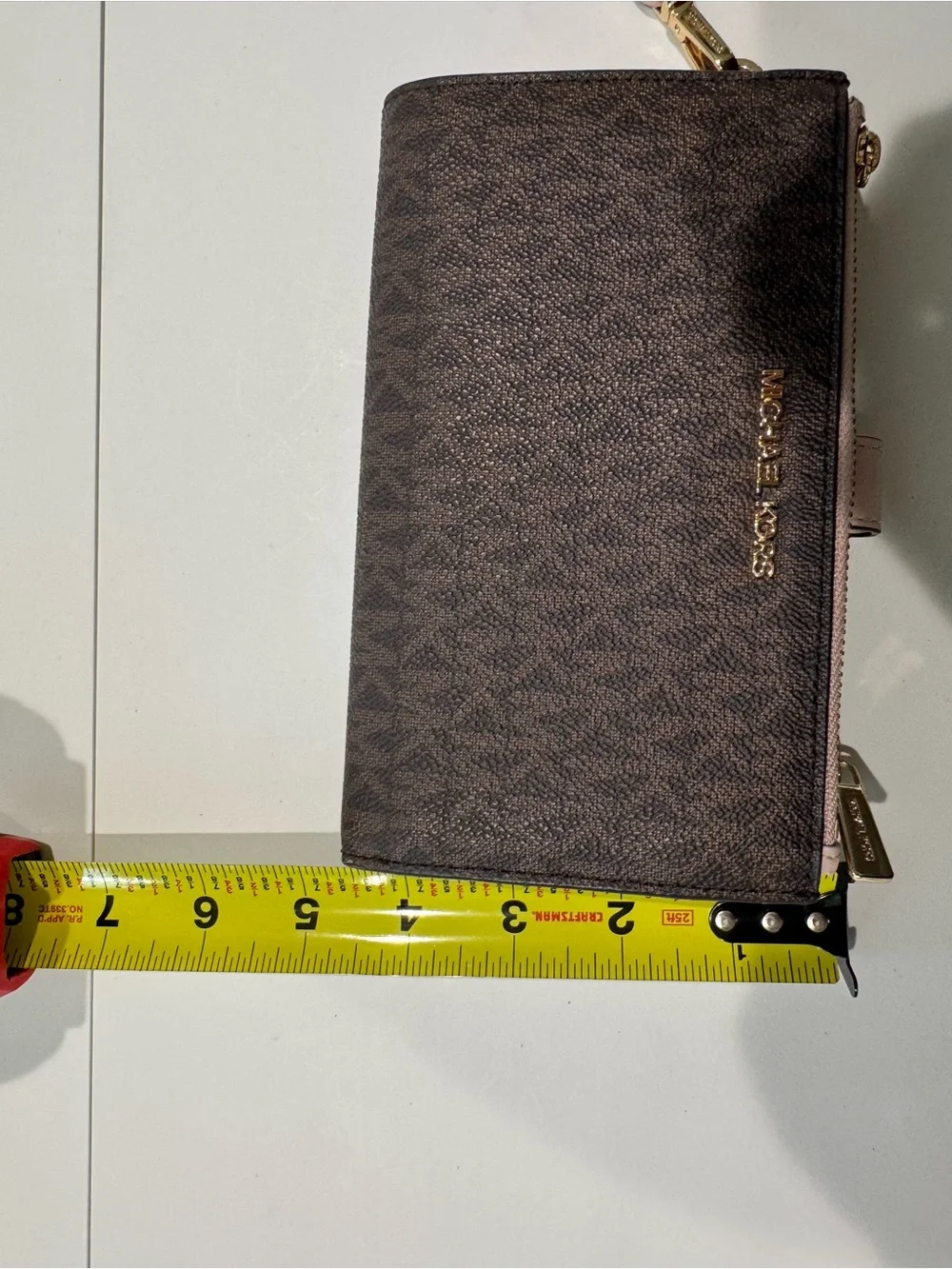 Michael Kors Brown Signature Wristlet with Pink Trim